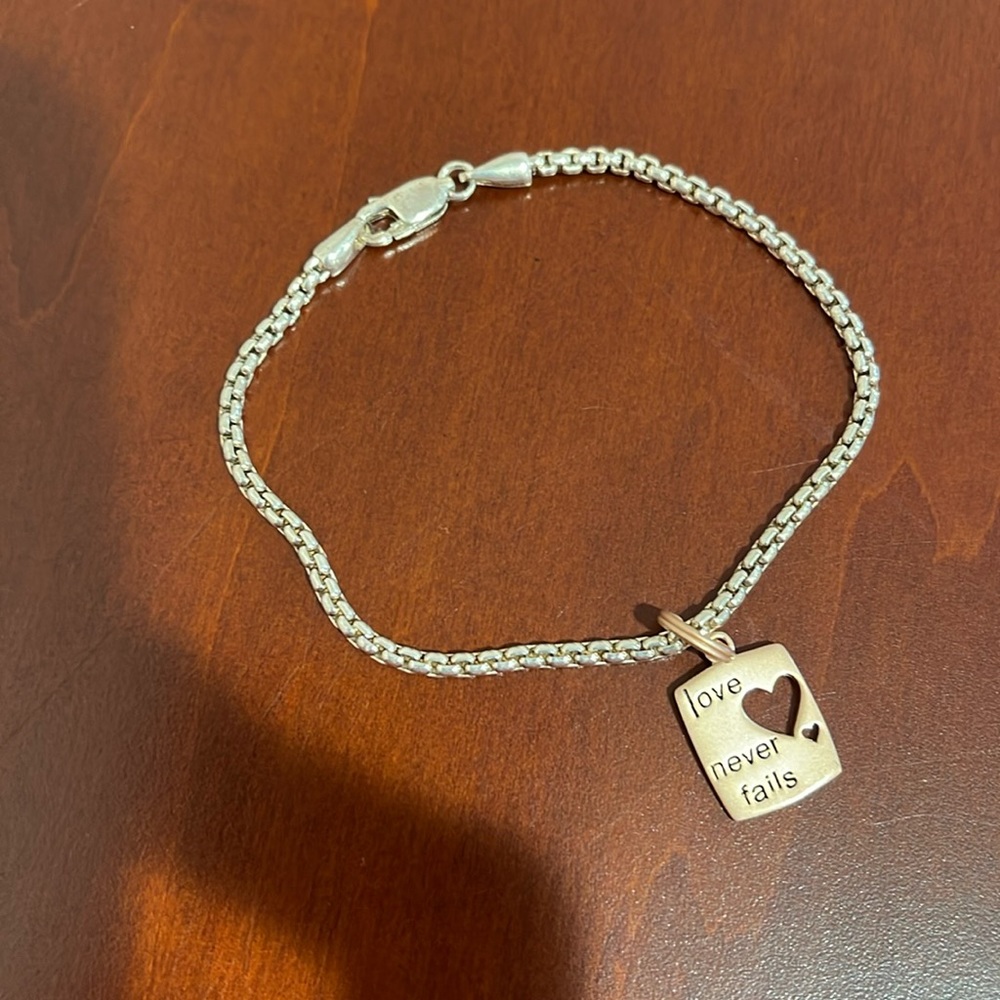 Love Never Fails Sterling Silver Charm Bracelet
